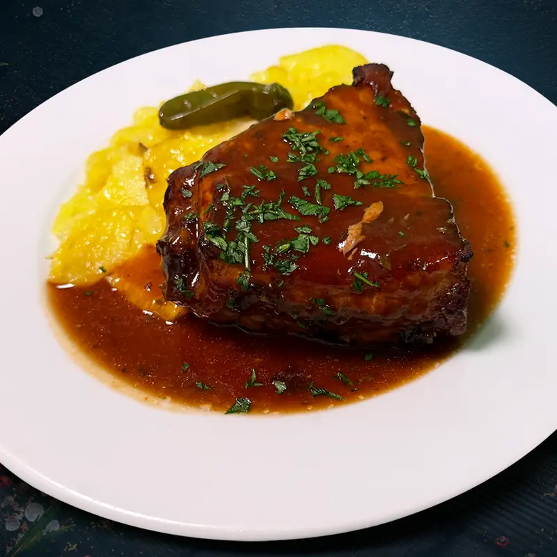 Costilla de cerdo al horno en salsa barbacoa